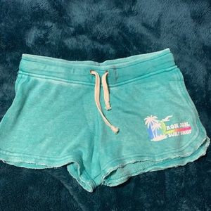 Ron Jon surf shop aqua shorts. Size medium.